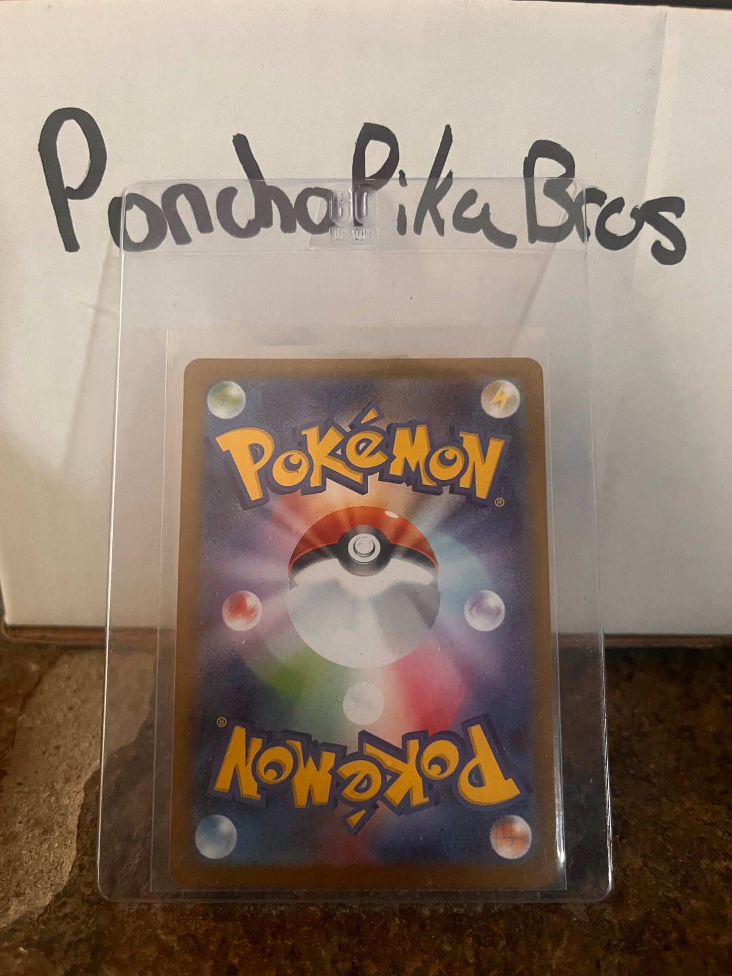 PONCHO PIKACHU CHARIZARD X, JPN PROMO #207/XY-P
