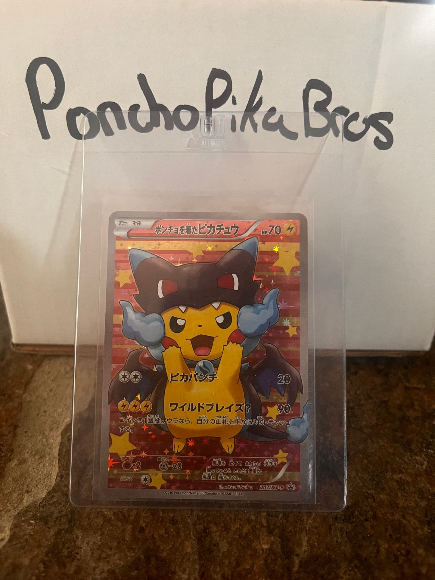 PONCHO PIKACHU CHARIZARD X, JPN PROMO #207/XY-P